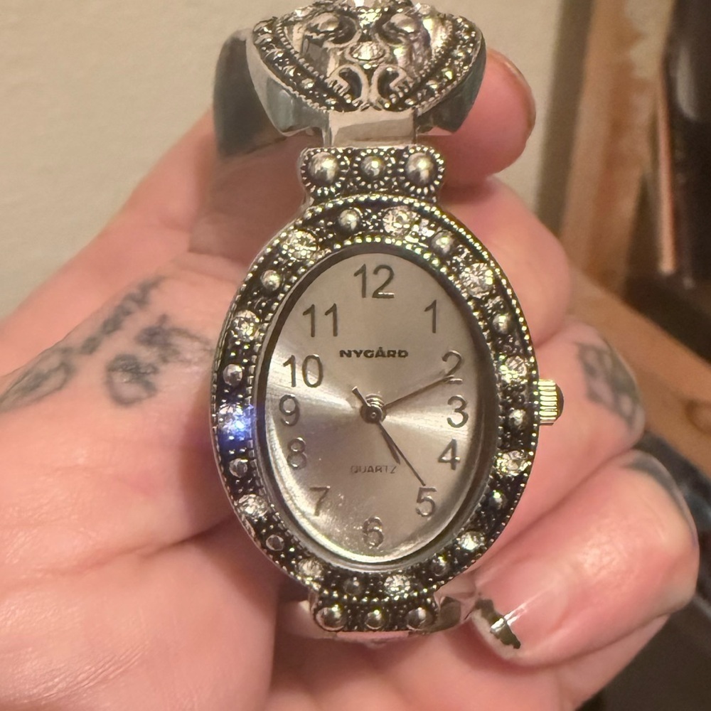 Women’s beautiful Nygard stainless steel silver toned watch.